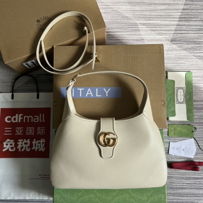 G*u*i top handle bags